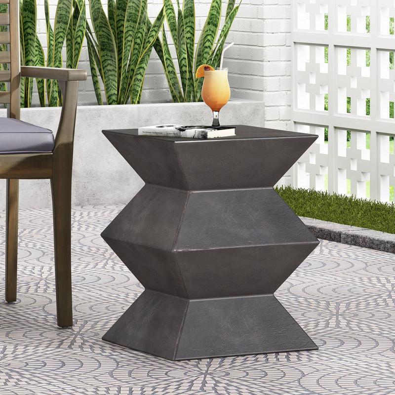Outdoor lightweight concrete side table by Noble House with copper finish, suitable for patio or garden decor.