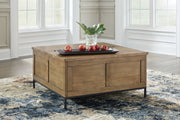 Torlanta - Lift Top Cocktail Table - Brown - R&R Furniture Gallery (Fountain Valley, CA)