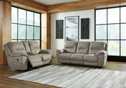 Signature Design by Ashley Next-Gen Gaucho reclining sofa and loveseat set in a modern living room setting.
