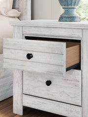 Signature Design by Ashley Makidern two-drawer nightstand with built-in charging station, dark wood finish, and modern design.