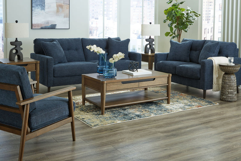 Signature Design by Ashley Bixler living room set with stationary sofas and loveseat, featuring plush cushions and modern fabric upholstery.