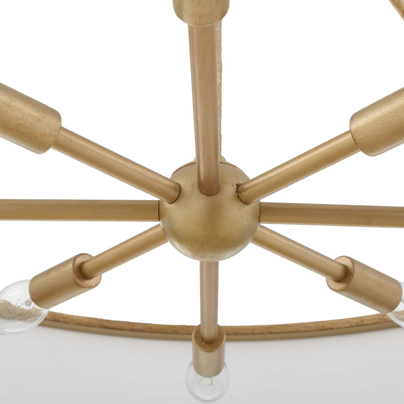 Uttermost Algiers 8-light gold and white drum pendant light hanging from ceiling in modern interior.