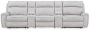 Signature Design by Ashley reclining sectional sofa with plush cushions and reclining features, perfect for relaxing living rooms.