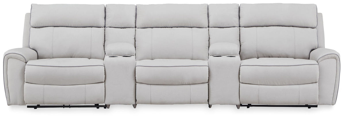 Signature Design by Ashley reclining sectional sofa with plush cushions and reclining features, perfect for relaxing living rooms.