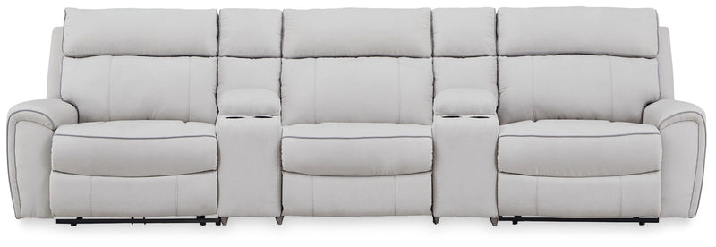 Signature Design by Ashley reclining sectional sofa with plush cushions and reclining features, perfect for relaxing living rooms.