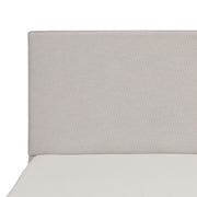 House & Home Furniture Lucas tall upholstered bed headboard with plush fabric and modern design, shown in a bedroom setting.