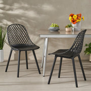 Set of two Noble House Lily chairs with sleek wooden legs and cushioned seats, perfect for modern dining or living spaces.