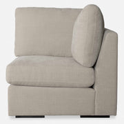 Uttermost Refuge corner sofa with plush cushions and modern design, shown in a stylish living room setting.