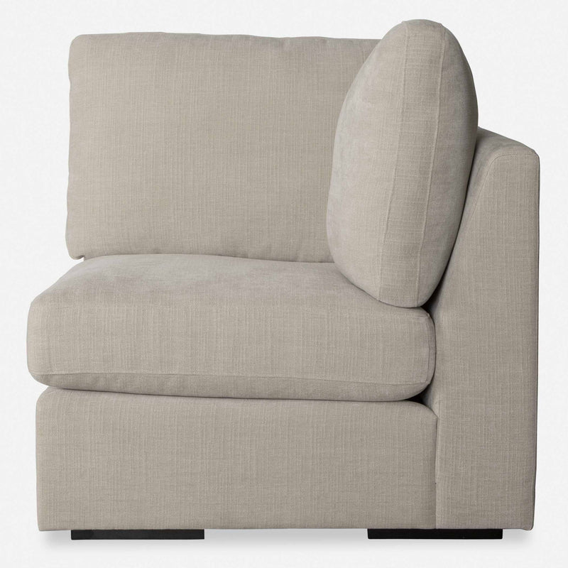 Uttermost Refuge corner sofa with plush cushions and modern design, shown in a stylish living room setting.