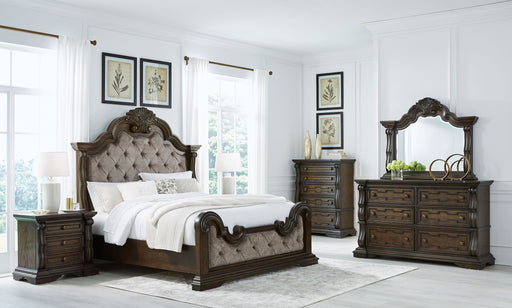 Maylee upholstered 6-piece bedroom set by Signature Design Ashley featuring a bed frame, nightstands, dresser, and mirror in neutral fabric.