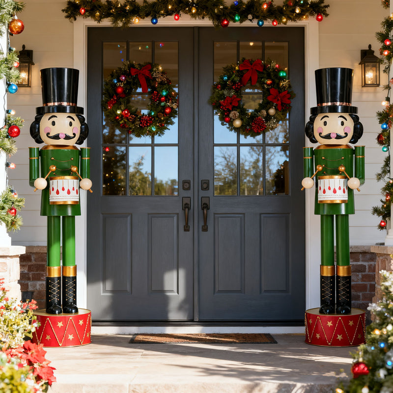 Noble House holiday nutcracker decor in green and red, festive Christmas figure with detailed painted design.