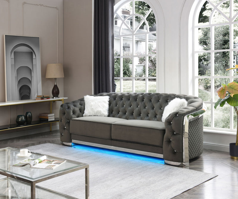 Glory Furniture Sapphire stationary sofa with plush cushions and modern design in a stylish living room setting.