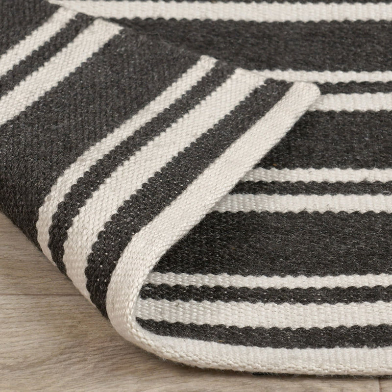 Classic Home Palma Stripe Rug, beige and white striped area rug with soft woven texture, ideal for living rooms or bedrooms.