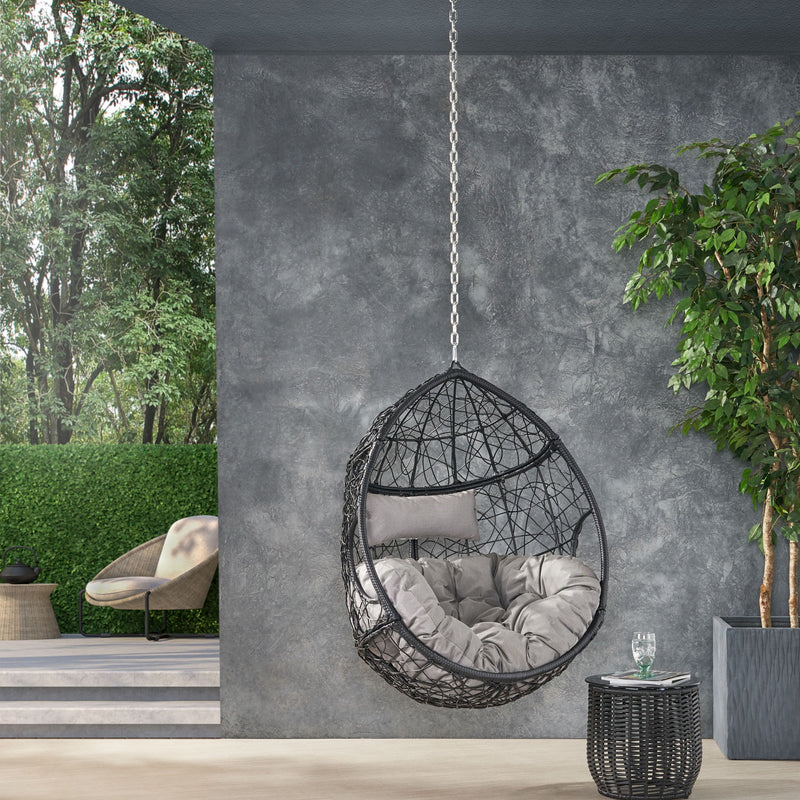 Noble House teardrop hanging chair with 8ft chain, stylish suspended hammock seat for indoor or outdoor relaxation.