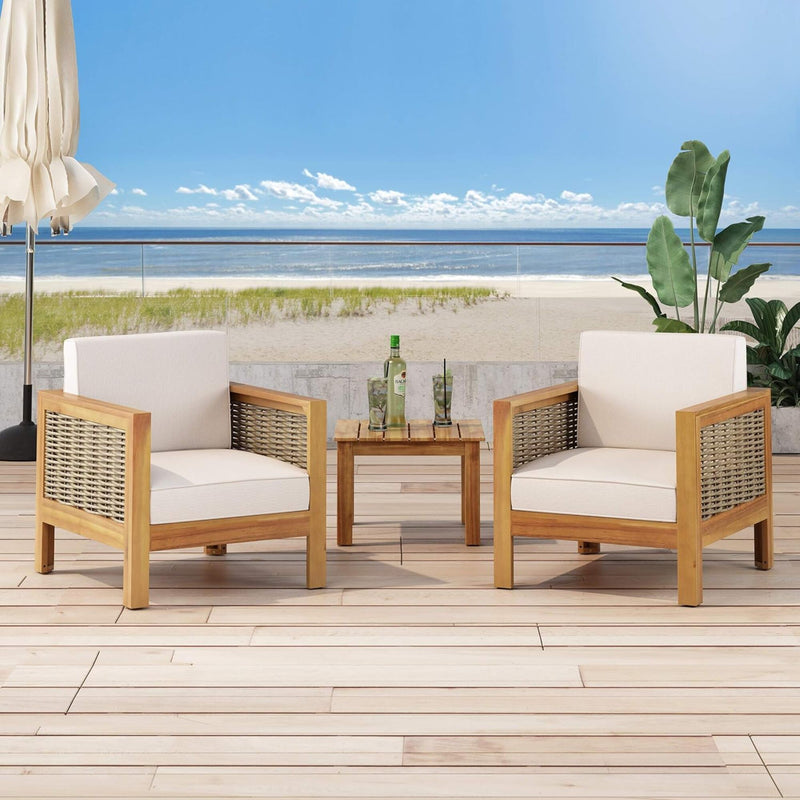 Outdoor acacia wood club arm chair with wicker accents by Noble House, featuring a stylish and comfortable design for outdoor seating.