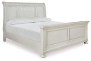 Signature Design by Ashley Robbinsdale sleigh bed set with six bedroom pieces, featuring classic wood finish and elegant design.