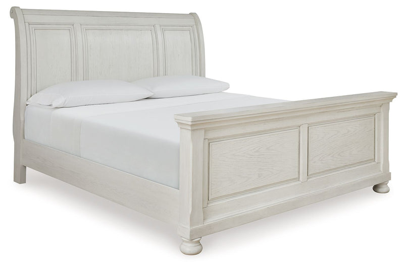 Signature Design by Ashley Robbinsdale sleigh bed set with six bedroom pieces, featuring classic wood finish and elegant design.