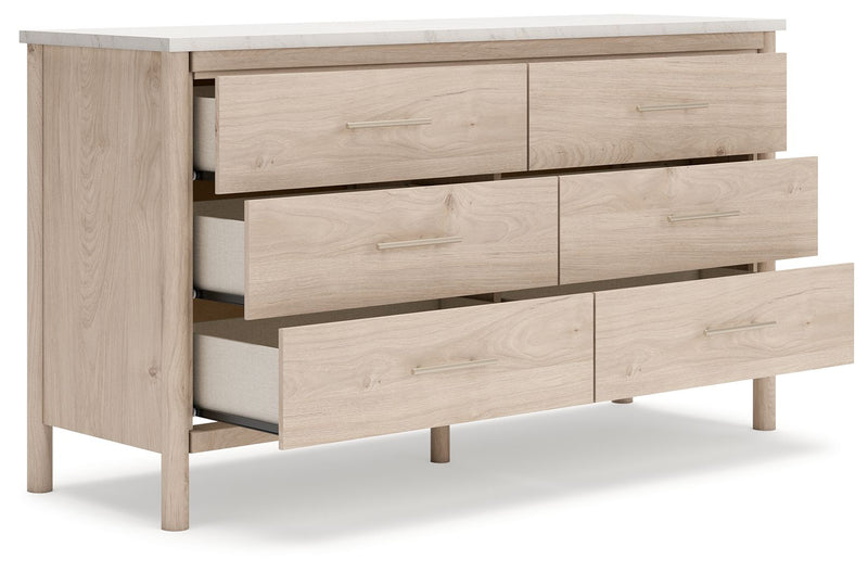 Six-drawer dresser from Signature Design by Ashley, featuring a sleek wood finish and modern hardware for stylish bedroom storage.
