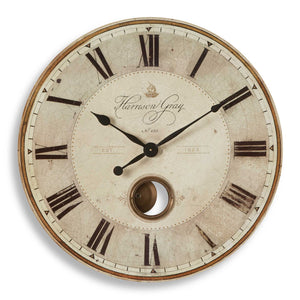 Uttermost Harrison Gray wall clock with round face and minimalist design, featuring a sleek gray finish and modern style.