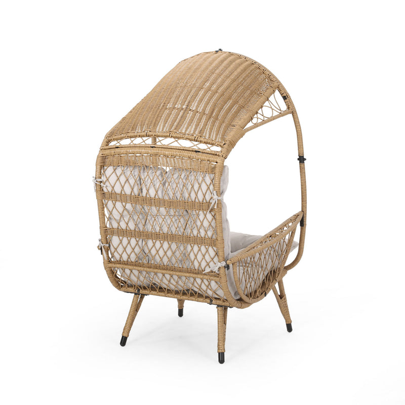 Noble House outdoor wicker standing basket chair with cushion, stylish accent chair for patio or garden seating.