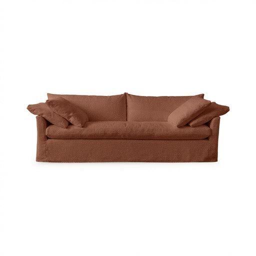 Classic Home Cassiano slip cover sofa featuring a beige fabric, plush cushions, and a sturdy stationary sofa design.