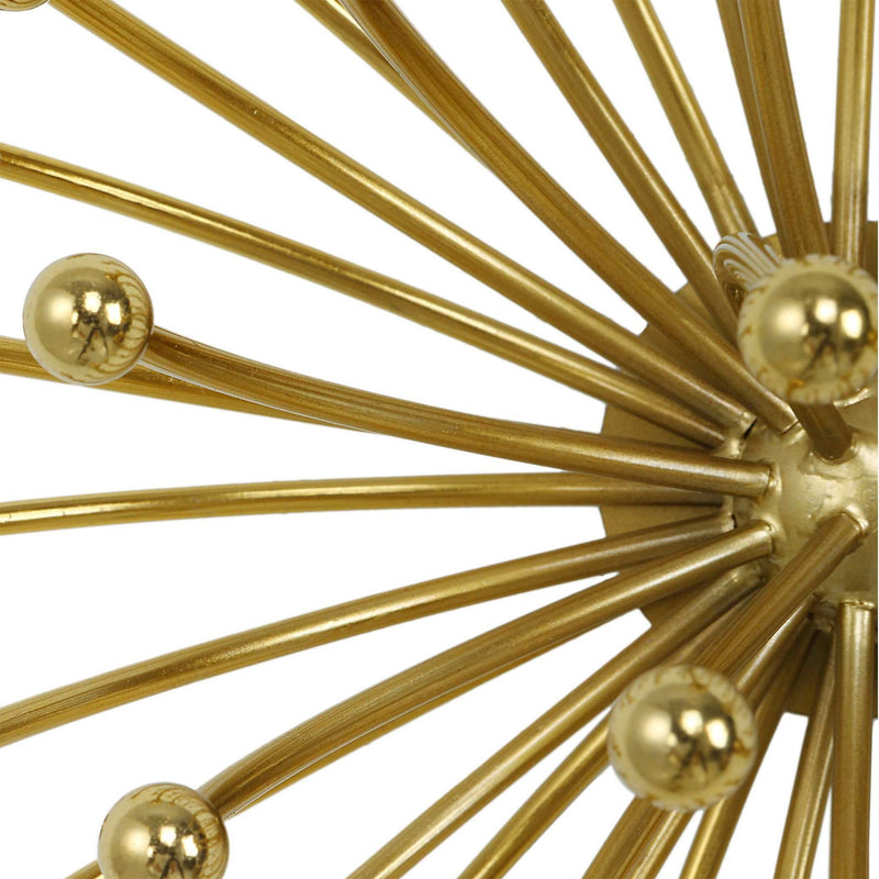 Set of three gold metal wall decor pieces by Uttermost, modern geometric wall art for contemporary home interior.