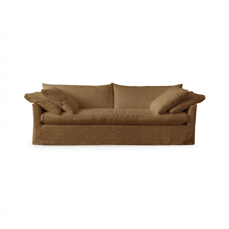 Classic Home Cassiano slip cover sofa with plush cushions and neutral fabric, perfect for a cozy living room setting.