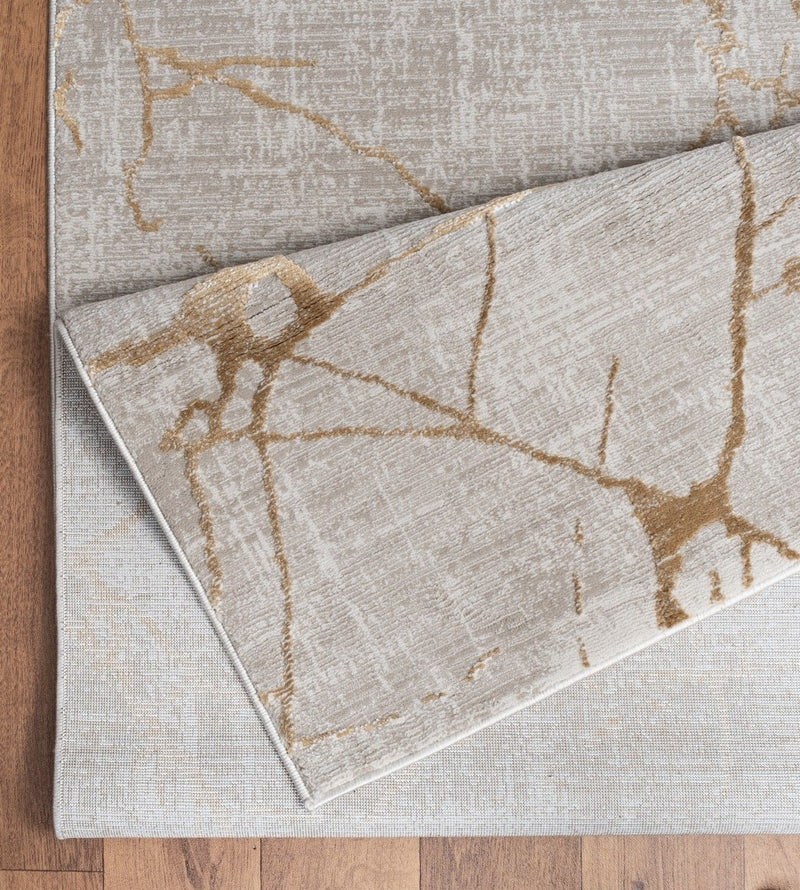 Elegance - 5'3" X 7'3" Area Rug - Gold, Polyester - R&R Furniture Gallery (Fountain Valley, CA)