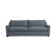 Olivia stationary sofa by Classic Home featuring plush fabric upholstery and a modern, streamlined design.