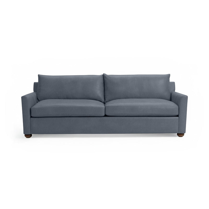 Olivia stationary sofa by Classic Home featuring plush fabric upholstery and a modern, streamlined design.