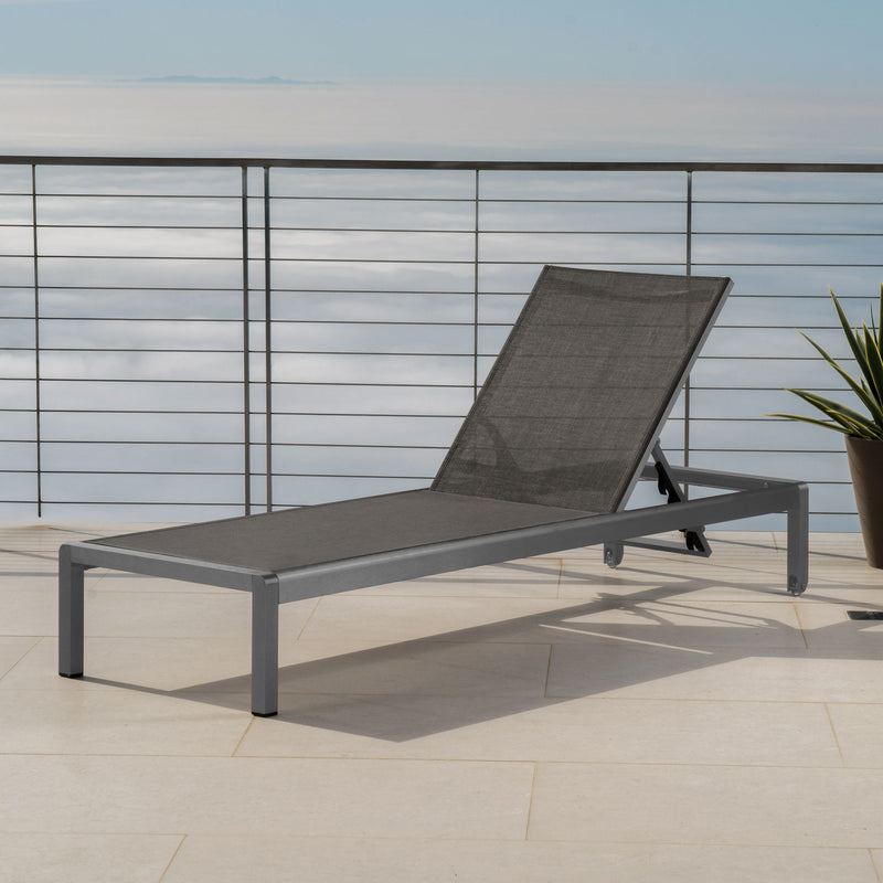 Noble House outdoor patio chaise lounge with five reclining positions, featuring a stylish design and comfortable cushions.