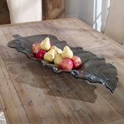 Dark gray glass tray with smoked leaf design by Uttermost, perfect for serving or decorative display.