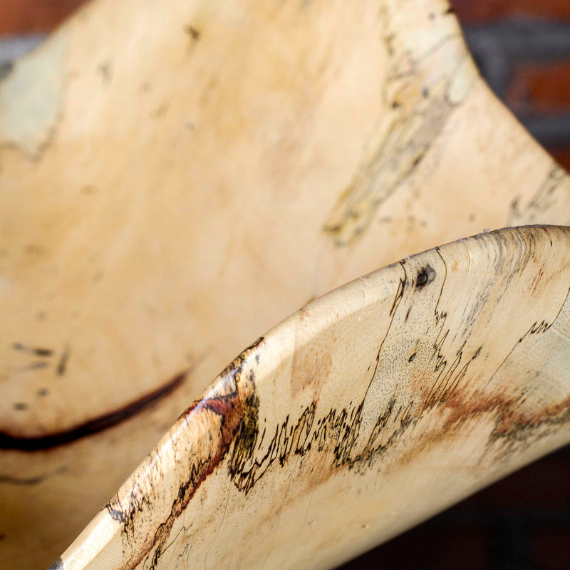 Uttermost Tamarine wood bowl in light brown, round plate with smooth finish, perfect for serving or decorative use