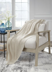 Gayelery Signature Design by Ashley® throw blanket with soft, cozy fabric and decorative fringe, perfect for adding warmth and style.