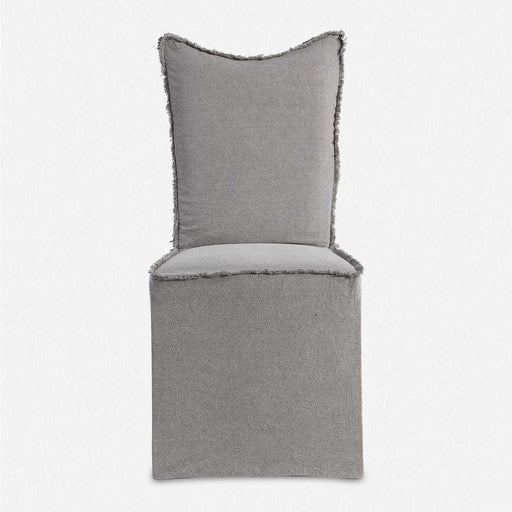 Set of two gray Narissa armless chairs by Uttermost, modern design with upholstered seats and sleek legs.