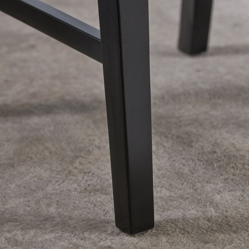 Set of two Noble House Plethora dining chairs with X-shaped back design, featuring wooden frames and upholstered seats.
