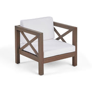 Noble House Brava mid-century modern arm chair with water-resistant cushions, featuring sleek design and plush seating.