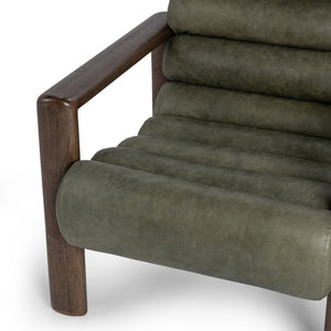 Classic Home Dahlia accent chair with plush upholstery and wooden legs, showcasing elegant design and comfortable seating.