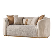Michael Amini Gineverra loveseat in biscotti and ivory gold with elegant upholstery and ornate wooden legs.