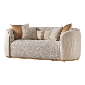Michael Amini Gineverra loveseat in biscotti and ivory gold with elegant upholstery and ornate wooden legs.