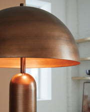 Signature Design by Ashley Wendfield metal floor lamp with a sleek, modern design and a tall, slender stand in a contemporary setting.