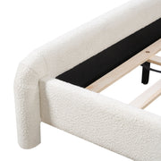 Artistry At Home upholstered platform bed frame with curved headboard and wood slats support, shown in a modern bedroom setting.