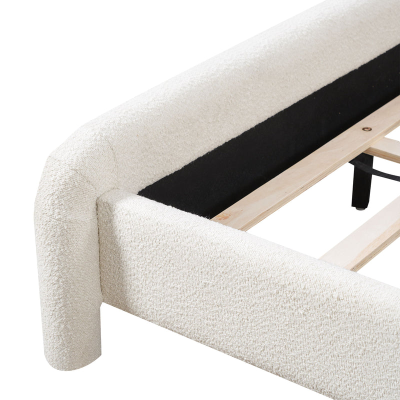 Artistry At Home upholstered platform bed frame with curved headboard and wood slats support, shown in a modern bedroom setting.