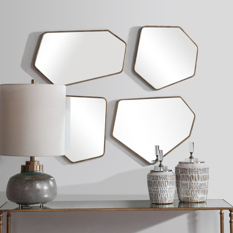 Set of four Uttermost Linneah modern gold wall mirrors with sleek, rectangular frames for stylish home decor.