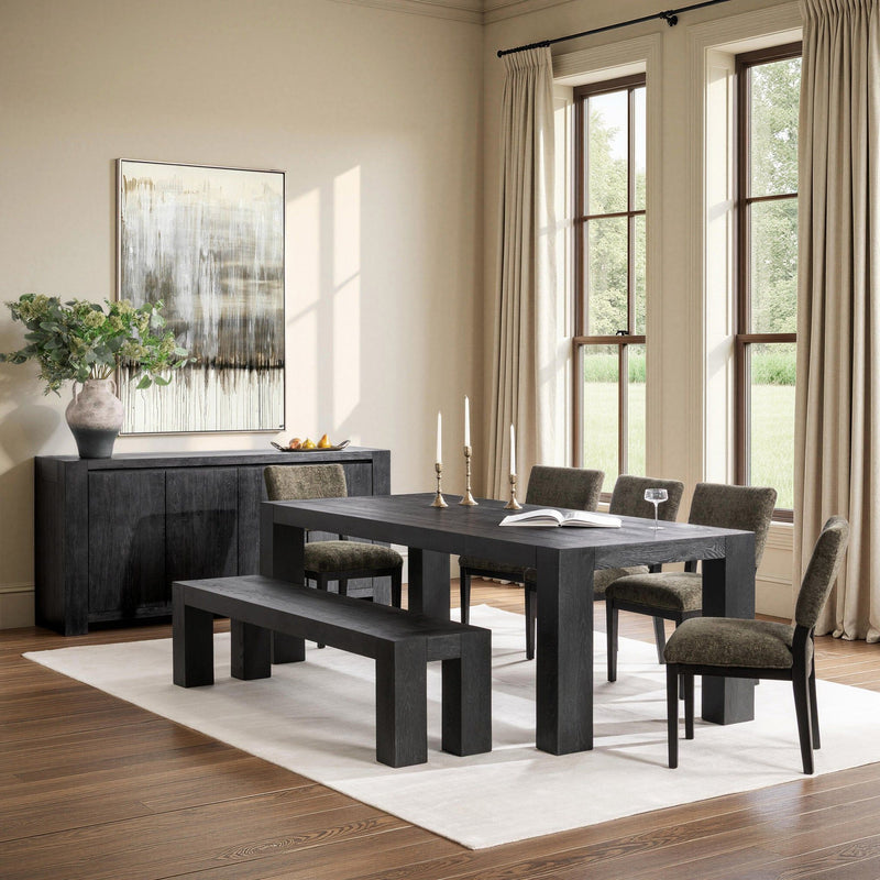 Classic Home Bristol dining table with wooden surface and sturdy legs, perfect for modern dining spaces.