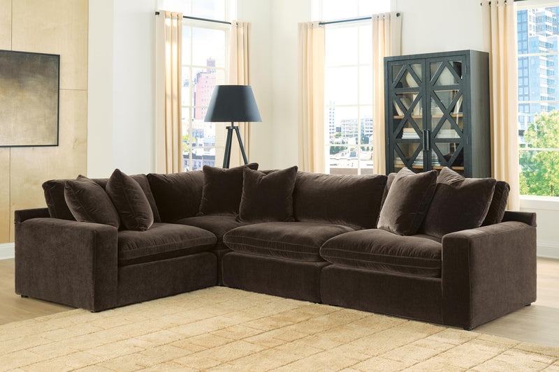Benchcraft® Maxton Heights stationary sectional with plush cushions and modern design, shown in a neutral fabric.