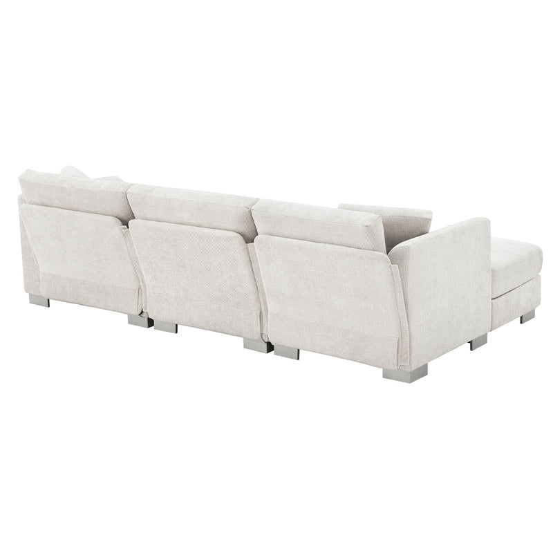 Luxe & Co. modern cloud L-shaped sectional sofa with oversized chaise, including two free pillows, in a stylish living room setting.
