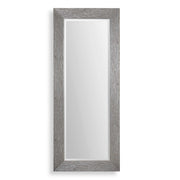Large silver floor mirror by Uttermost, with a sleek, modern frame reflecting a spacious room.