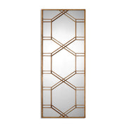Uttermost Kennis Leaf Leaner Mirror in gold with decorative leaf design on a tall, elegant mirror frame.