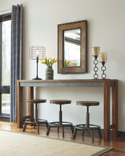 Torjin - Long Counter Table - Dark Brown - R&R Furniture Gallery (Fountain Valley, CA)